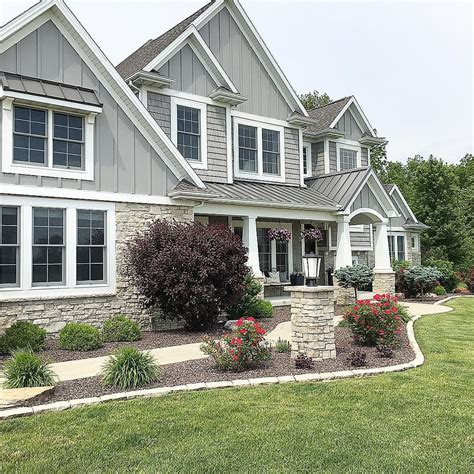 gray craftsman house with metal roof|light gray house colors.